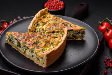 Delicious fresh quiche with broccoli, cheese, spices and herbs cut into pieces