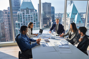 International happy professional business team consulting at group meeting. Multicultural busy...