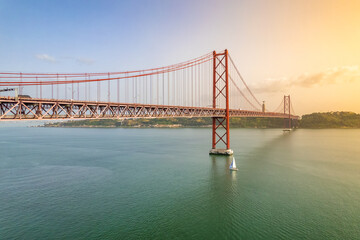 Fototapeta na wymiar Aerial view of the 25 de Abril Bridge in Lisbon, Portugal