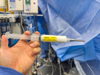 Hospital tools like syringes, drugs, and IV fluids encapsulate healing and peril. They embody opioid crisis, treatment, and intervention, their potency evident in fentanyl, propofol, vasopressors