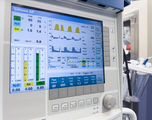 Hospital monitors display vital signs: heart rate, oxygen saturation, temperature, CO2 levels, blood pressure. Symbolize patient's health status and medical care vigilance