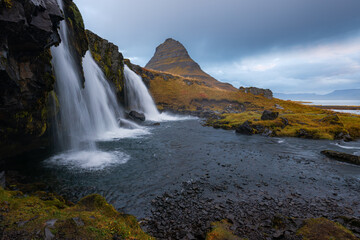 Fototapeta na wymiar Icelandic landscape - Kirkjufellsfoss waterfalls and mount kirkjufell