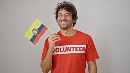 Young hispanic man activist holding colombian flag over isolated white background - Powered by Adobe