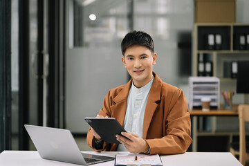 Smiling confident mature businessman leader looking at camera in office.