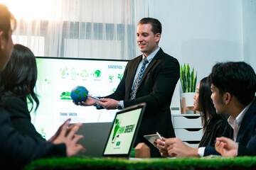 Businessman leader give presentation on eco-friendly implementation in order to reduce CO2 emission...