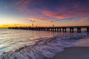 Woodman Point Perth Jetty at Sunset, Coogee West Australia. Motion blur water. 