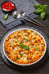 tortellini bake with cheese, tomato sauce, beef
