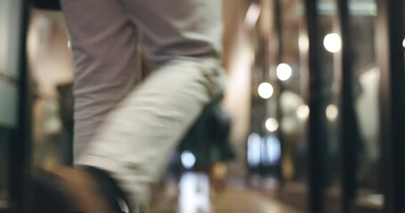Walking, business people and blurred office in background, of workplaace with professional employees or staff. Company, lobby and workers moving in the hall, busy corridor and hallway in agency