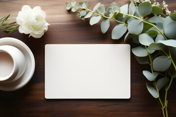 Minimalist branding / business card mockup with boho decor and eucalyptus twigs on a styled desk. white and neutral hues