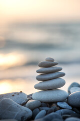 Stones balance on beach. Zen meditation and relaxation. vertical photo
