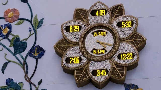 Arabic Classic clock running fast in time lapse with prayer timing