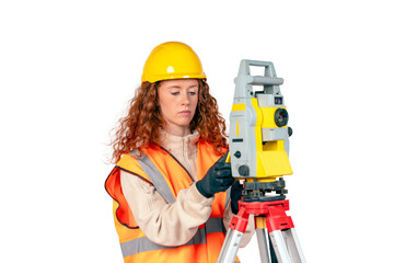 Redhair Woman in yellow hardhat and yellow ppe surveyor working with modern surveying geodesic instrument tacho meter checking coordinates.  Young woman working in construction industry concept
