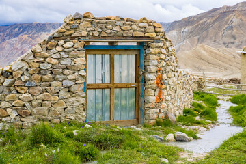 Ruins of a Home and Stone Wall beside a creek in Lho Manthang, Upper Mustang in Nepal