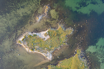 Aerial view of maritime sea landscape, seascape. Wild nature and water. Stones, grass and water. Untouched nature. National nature reserve, national park.