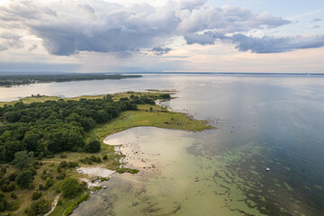 Aerial view of maritime sea landscape, seascape. Wild nature and water. Stones, grass and water. Untouched nature. National nature reserve, national park.