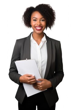 young woman holding her resume while standing against a white background