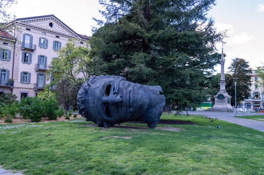 Lugano, Switzerland - March 5, 2023: Famous monument shaped head called "Eros Blindfolded" artist Igor Mitora
