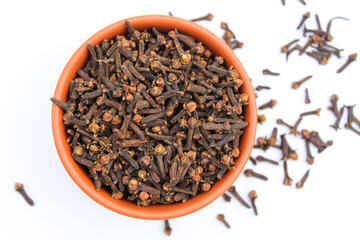 Dried Cloves on white background top view 