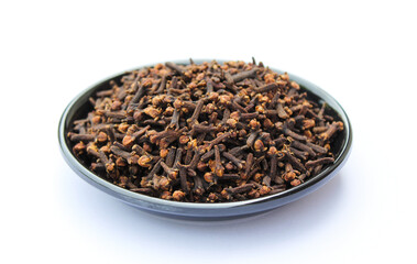 Dried Cloves in a plate on white background 