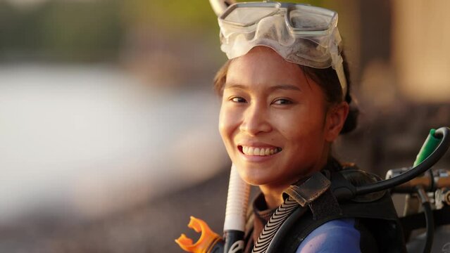 Close up portrait of female scuba diver on tropical vacation in asia, holiday