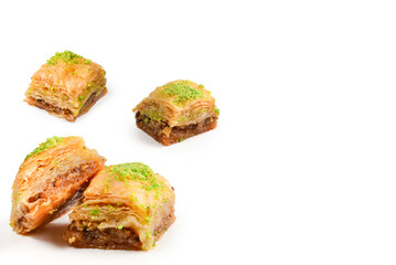 Pistachio baklava on a white background. Dessert.