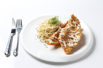 deep fried crispy fish fillet chips with fried egg, French fries, coleslaw salad, in tartar sauce carbonara pasta on brown leather white background western chef halal food restaurant banquet menu cafe