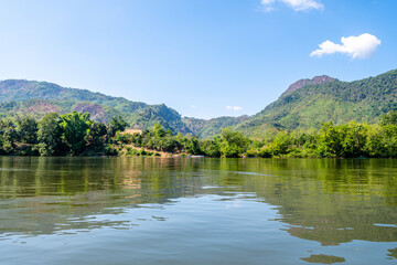 Fototapeta na wymiar boat trip at nam on river in laos