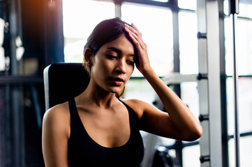 Lifting tiredness from exercise by lifting weights and sit back and wipe the sweat off your face. Muscular and strong body building activities