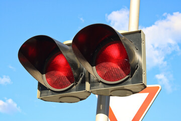 Traffic light with two red lights - the light signal of alternately flashing lights means that the driver is obliged to stop the vehicle