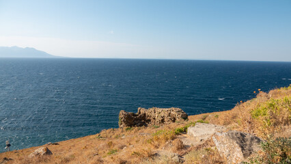 Fototapeta na wymiar Seascape from ancient Kalekoy castle with Greek Island Samothrace view- turkish aegean island Gokceada (Imbros) Canakkale, Turkey