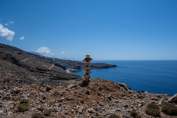 Panoramic view of the mountains of the Gorge and the Sea against the backdrop of the blue sky on the island of Crete Sunny Day