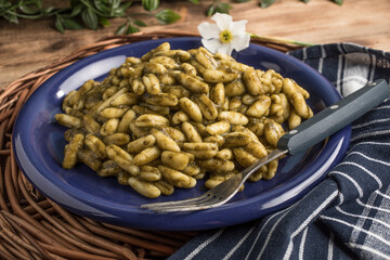 Cavatelli pasta with fresh spinach sauce.