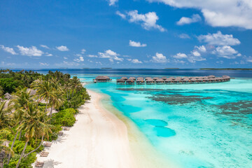 Stunning aerial landscape, luxury tropical resort with water villas. Beautiful island beach, palm...