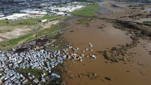 Aerial View of Informal Settlement Submerged in Muddy Floodwater, Cape Town, South Africa