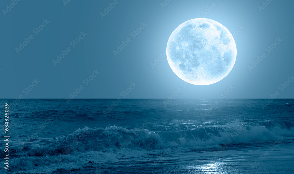 Poster night sky with blue moon in the clouds sea wave in the foreground 