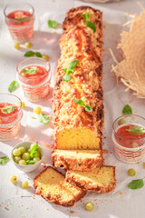 Tasty gooseberry yeast cake with glaze and crumble.