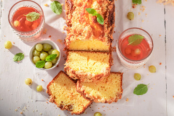 Homemade gooseberry yeast cake as fresh summer dessert.