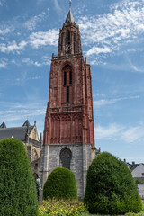 exterior of Saint Jan's church and the Torren of St jan. Religious landmark building in Maastrict Netherlands on sunny summer day