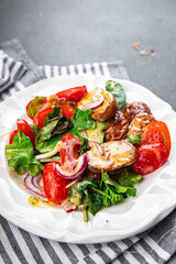potato salad baked vegetable potato, tomato, onion, salad leaves vegetables food healthy meal food snack on the table copy space food background rustic top view 