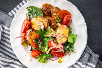 potato salad baked vegetable potato, tomato, onion, salad leaves vegetables food healthy meal food snack on the table copy space food background rustic top view 