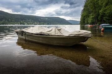 The french lake called longemer in the vosges. Ideal for boats, recreation and holidays, photo taken on a cloudy day