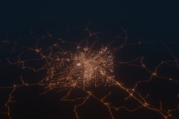 Aerial shot of Yamoussoukro (Ivory Coast) at night, view from south. Imitation of satellite view on modern city with street lights and glow effect. 3d render