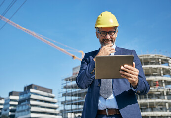 businessman construction site business architect building engineer builder tablet helmet...