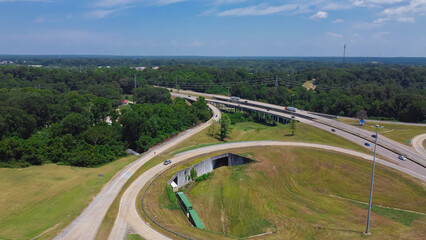 Circular highway exit or ring road with railroad tunnel, large drainage system, overpass, viaduct...