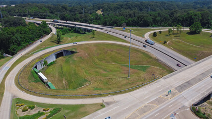 Circular highway exit or ring road with railroad tunnel, large drainage system, overpass, viaduct...