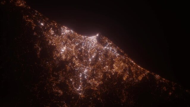 Durban (South Africa) top view at night. Aerial view on modern city from space. Camera is flying above the city, moving forward. Vertical video. The north is on the left side