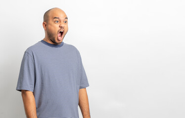 Shocked face. Happy Young asian man on isolated white background. Handsome middle aged Indian man