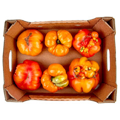 tomatoes in a wooden box