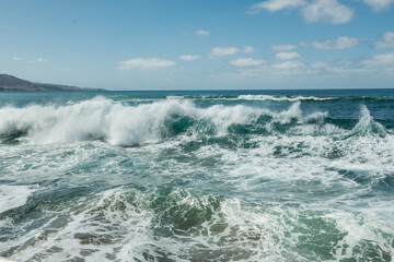 rough sea with a strong surge of white foam 