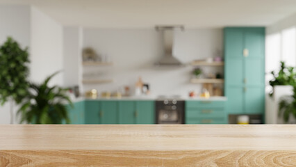 Wooden table top on blur kitchen room background,Modern Contemporary green kitchen room interior.